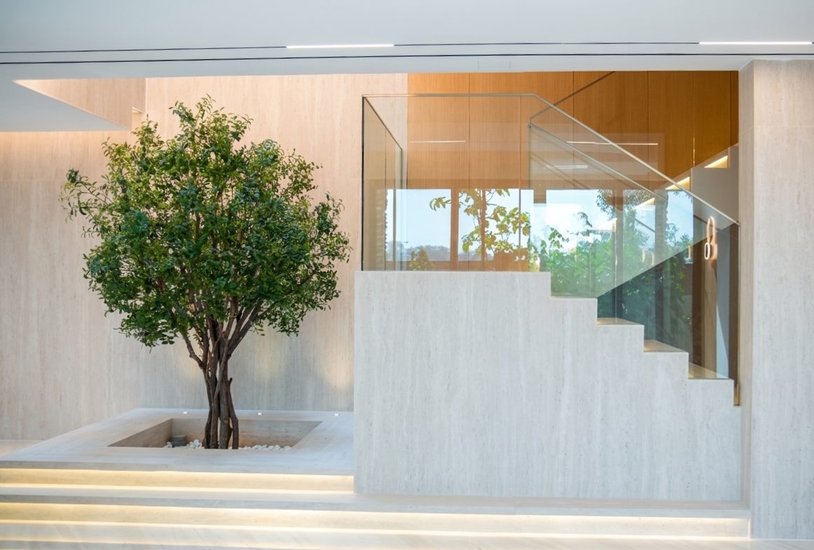 Reception and staircase in a Dubai office fit-out by NovaPlex