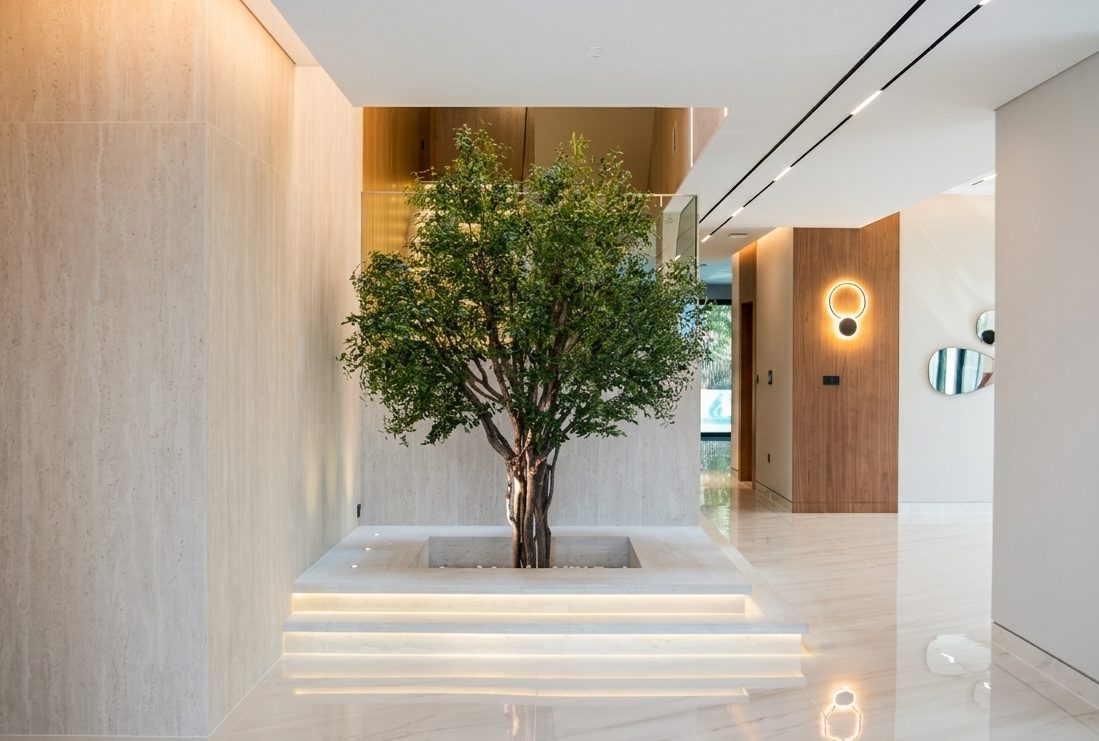 Sculptural foyer with sculpted tree