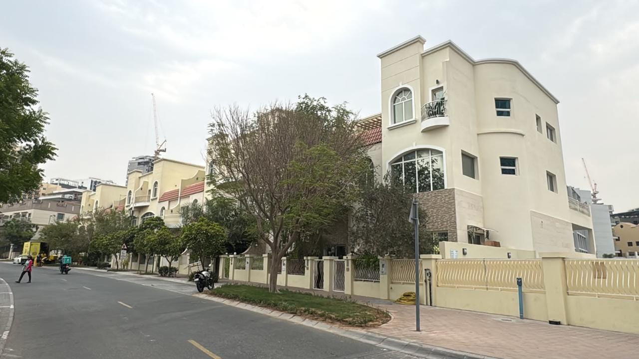 Three-storey corner villa with curved glazing in Jumeirah Village Circle, Dubai